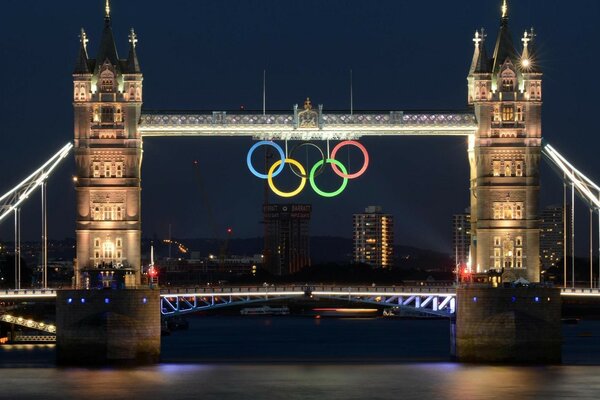 The symbol of the Olympic Games on the river bank