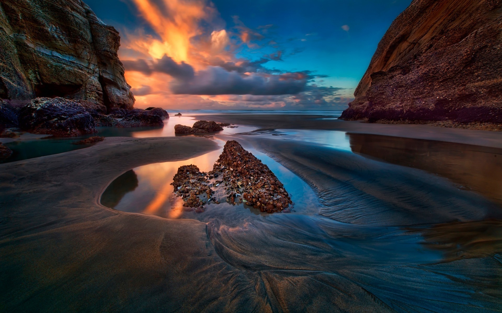 landscapes water sunset landscape travel beach dawn seashore ocean evening sea rock sand scenic seascape sun sky dusk nature reflection clouds