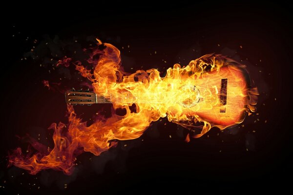 Burning guitar on a black background