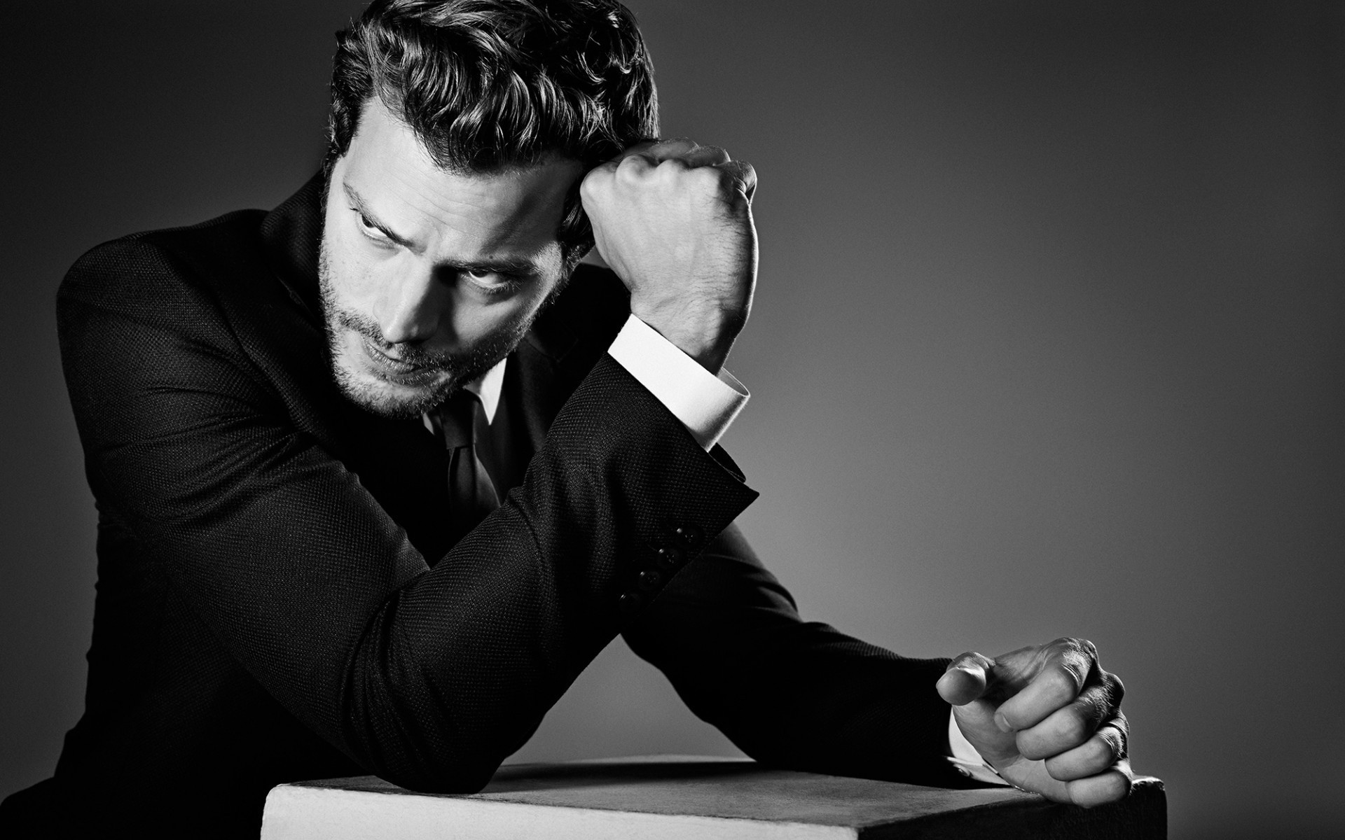 men portrait man one adult monochrome concentration facial expression wear business table jamie dornan actor