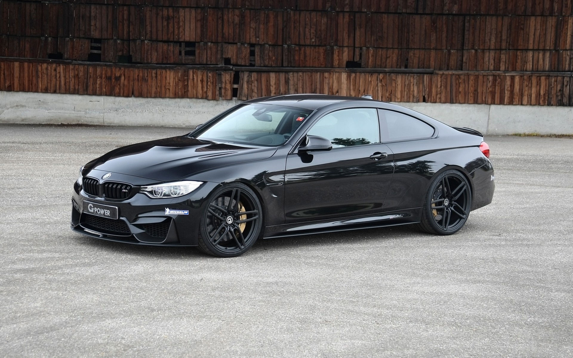 bmw coche coche negro automóvil acera ruedas asfalto coupé prisa unidad mediodía sistema de transporte acción bmw m4