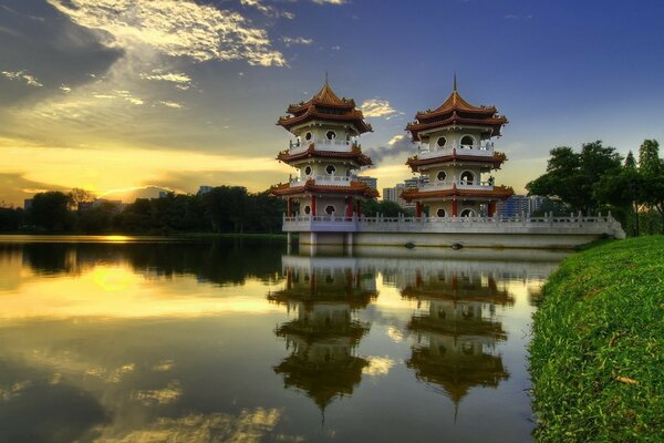 Reflection of the building in the lake at sunset