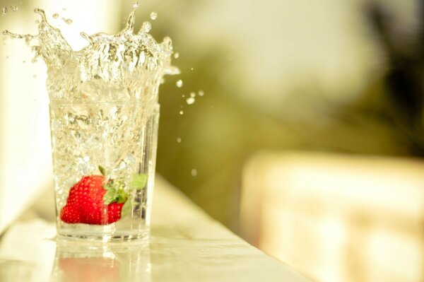 Strawberries in a splash of icy water