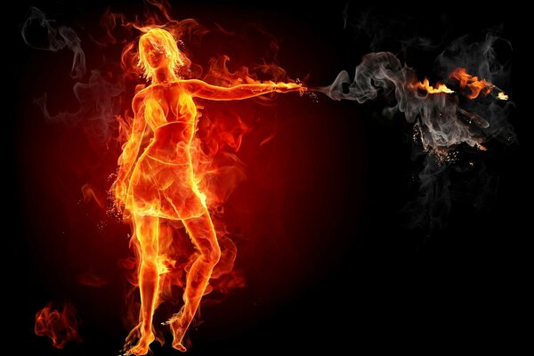 The fiery girl. Fire. Dark background