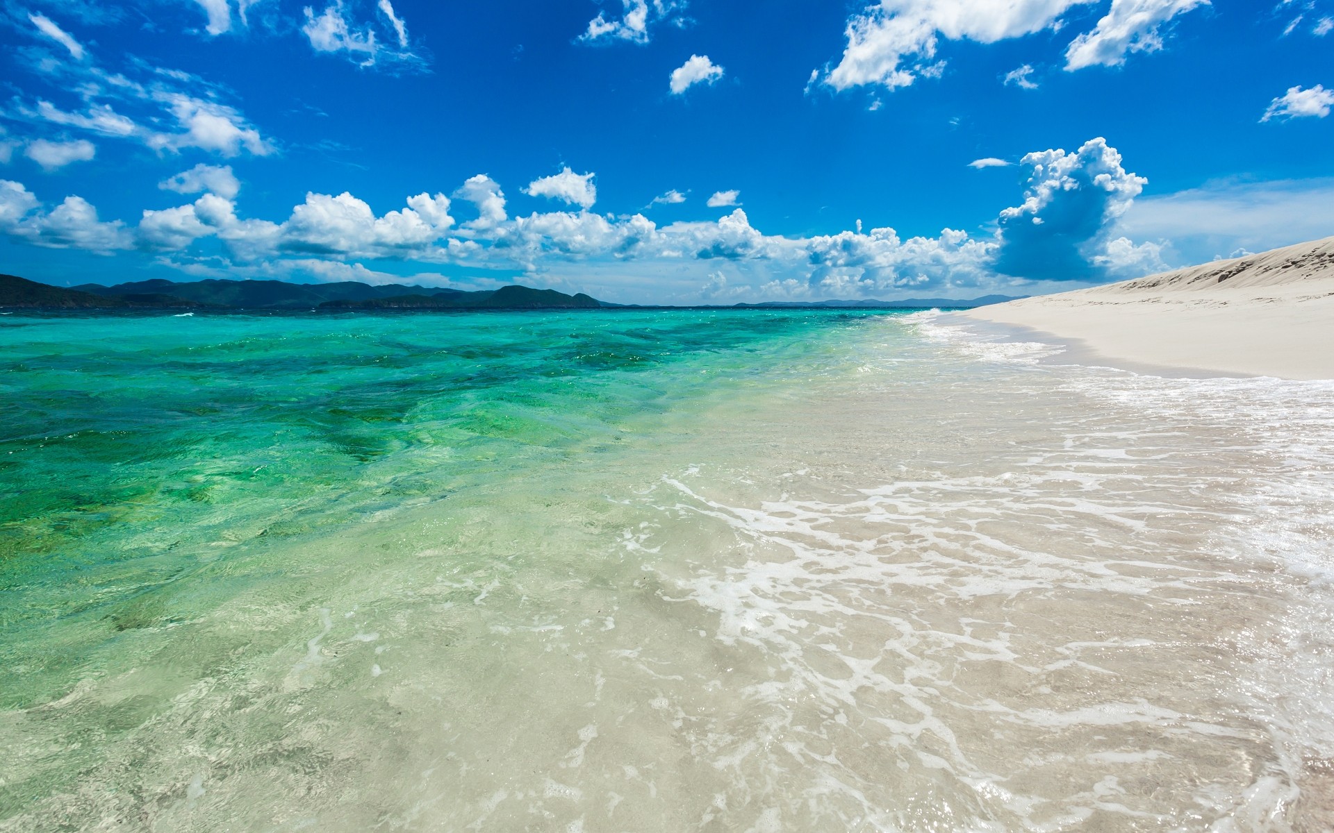 landscapes water sand beach tropical travel surf summer sea sky seascape ocean seashore fair weather island nature sun turquoise vacation landscape shore waves clouds