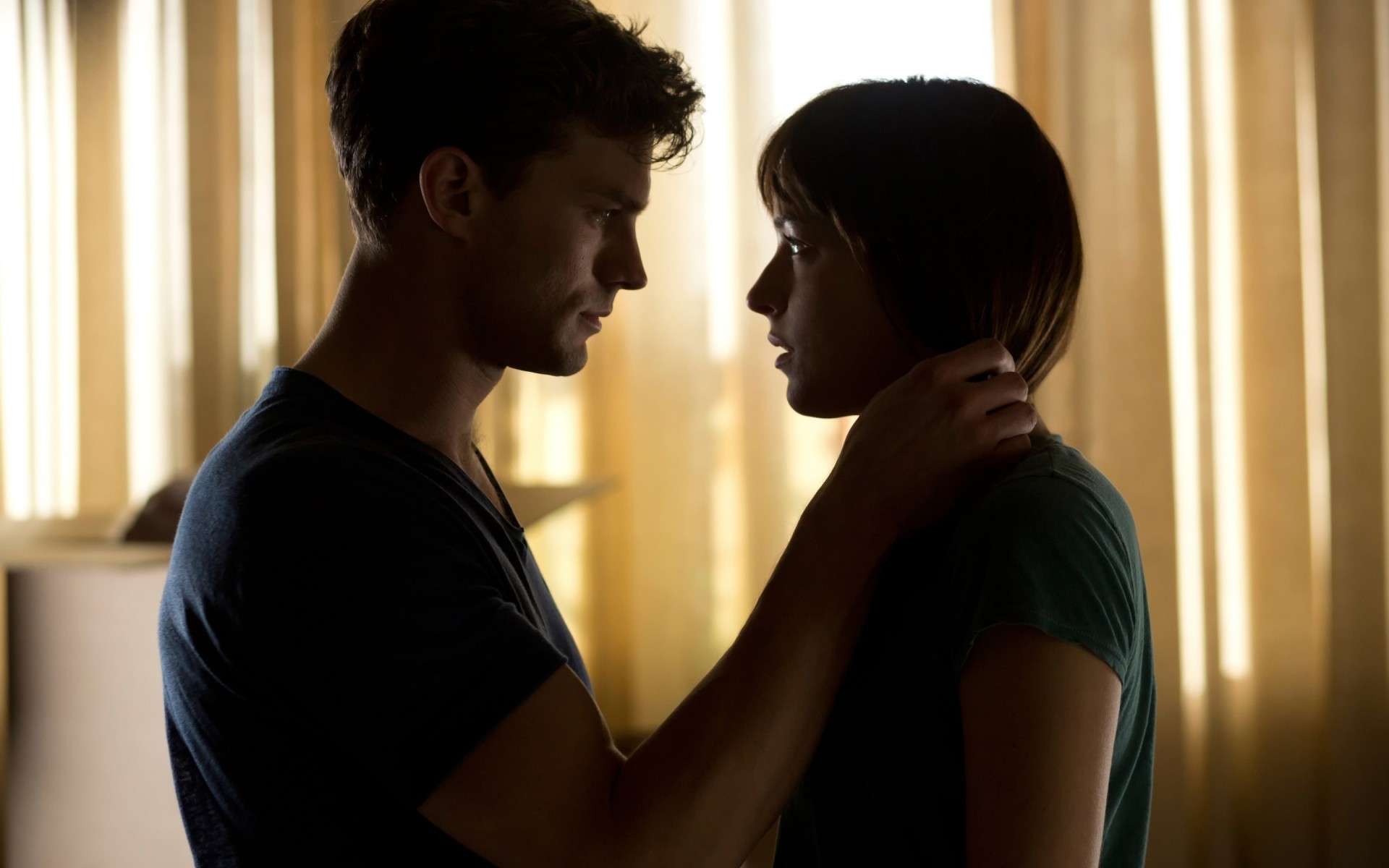 movies woman indoors man side view adult two facial expression portrait affection togetherness blur profile love wear dakota johnson jamie dornan christian grey anastasia steele