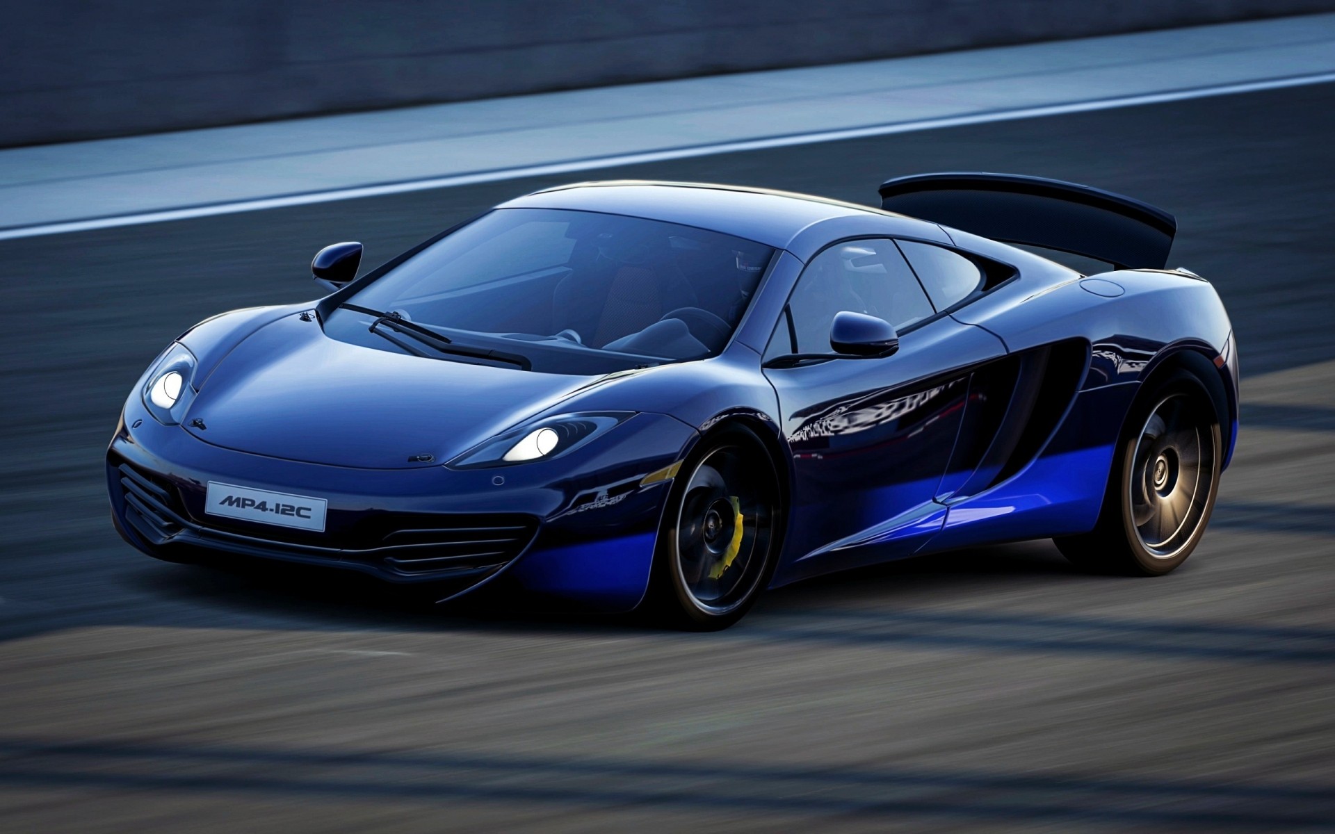 mclaren coche coche ruedas prisa carrera rápido coupé automotriz acción asfalto negro acera sistema de transporte mclaren mp4 12c