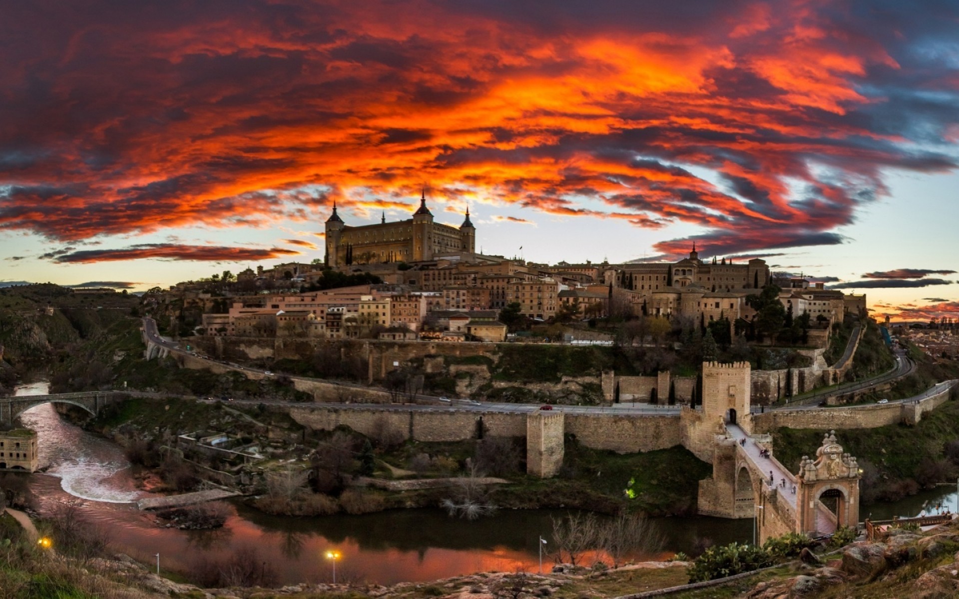 spain architecture travel sky outdoors landscape water building sunset evening city toledo night river castle