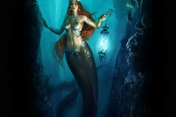 A girl in the form of a mermaid under water with a lantern in her hands