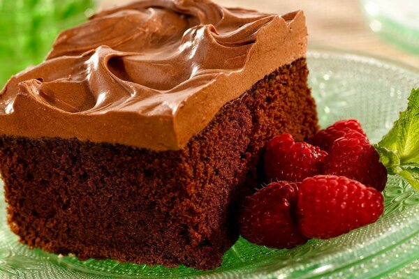 Chocolate cake and red strawberries