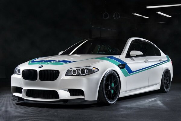 White car with blue and green stripes