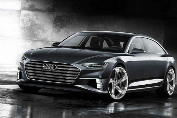 Gray audi on a concrete background