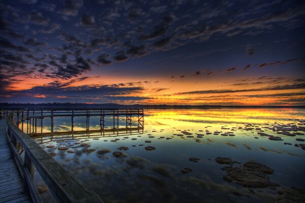 Sunset on the sea embankment