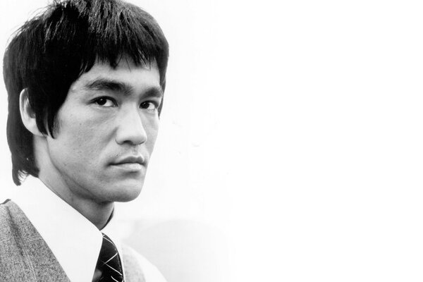 Black and white photo of an Asian man