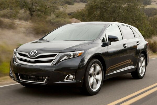 Black Toyota on the highway