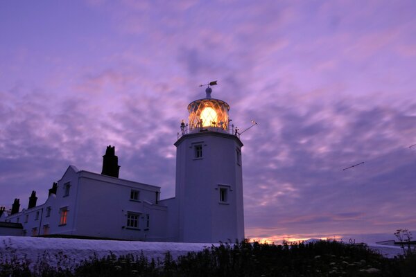 A bright lighthouse on a high tower