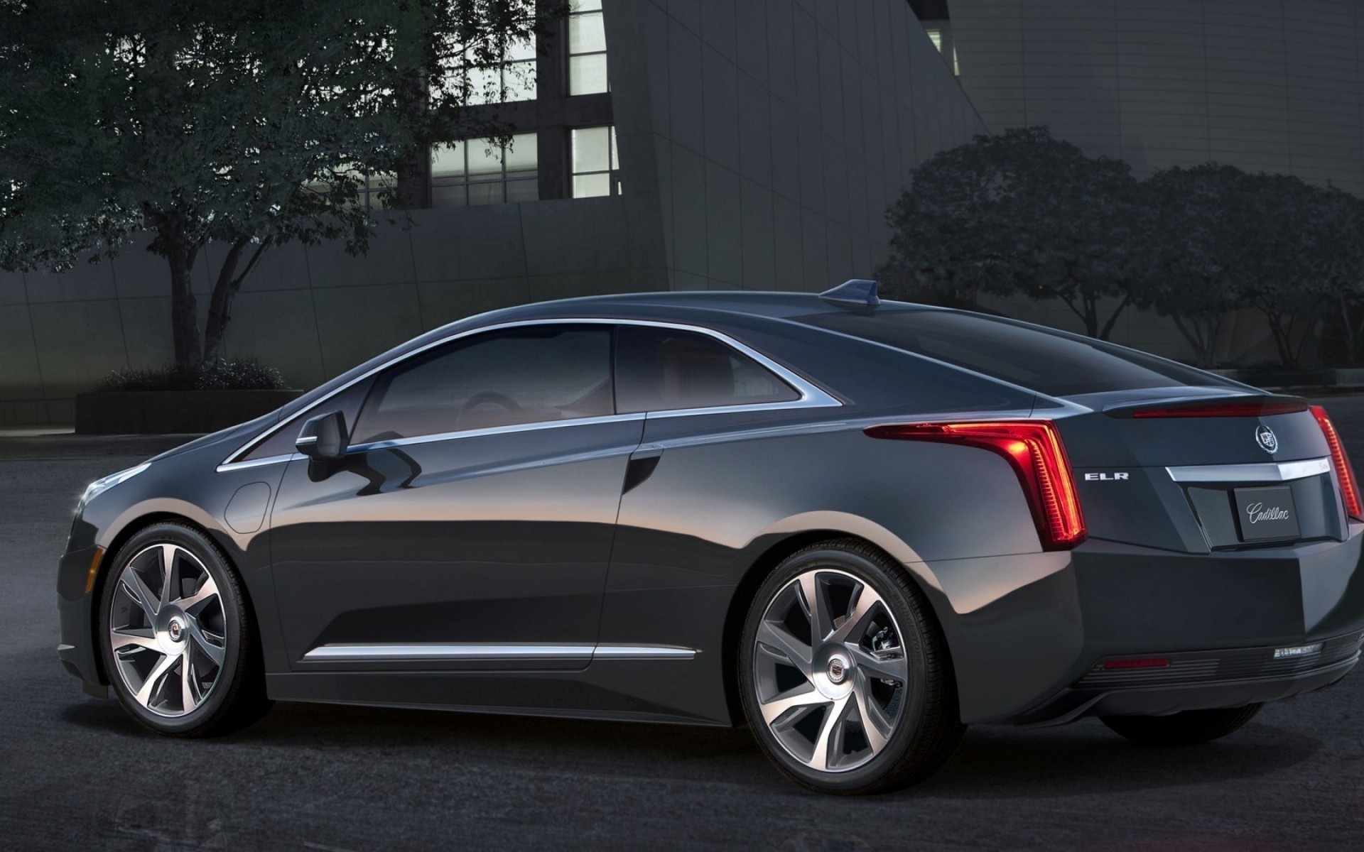 cadillac auto auto automobil coupé schwarz räder limousine bürgersteig transportsystem mittags asphalt motorhaube antrieb