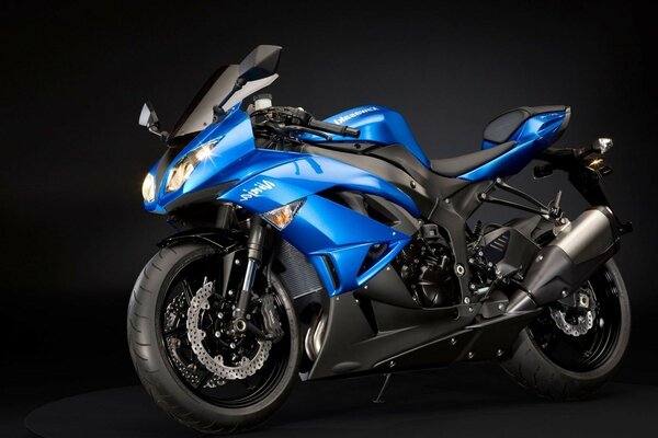 Blue sports bike on black wheels