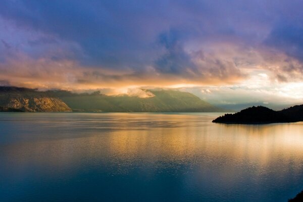 Sunrise landscape over the surface of the water