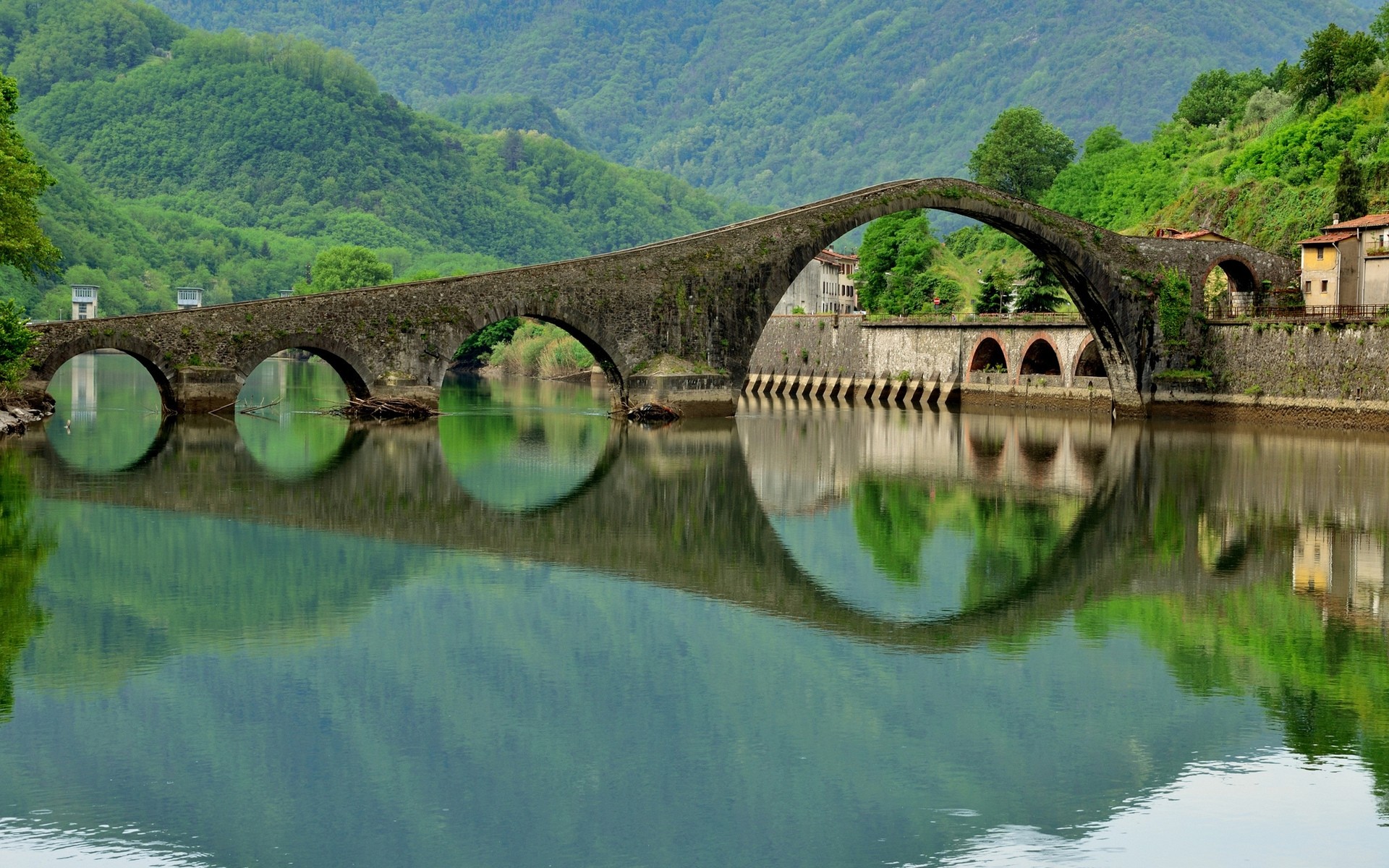 italy bridge water river landscape nature travel scenic tree lake summer reflection tourism sight mountain architecture scenery grass stone stream flora ponte del diavolo