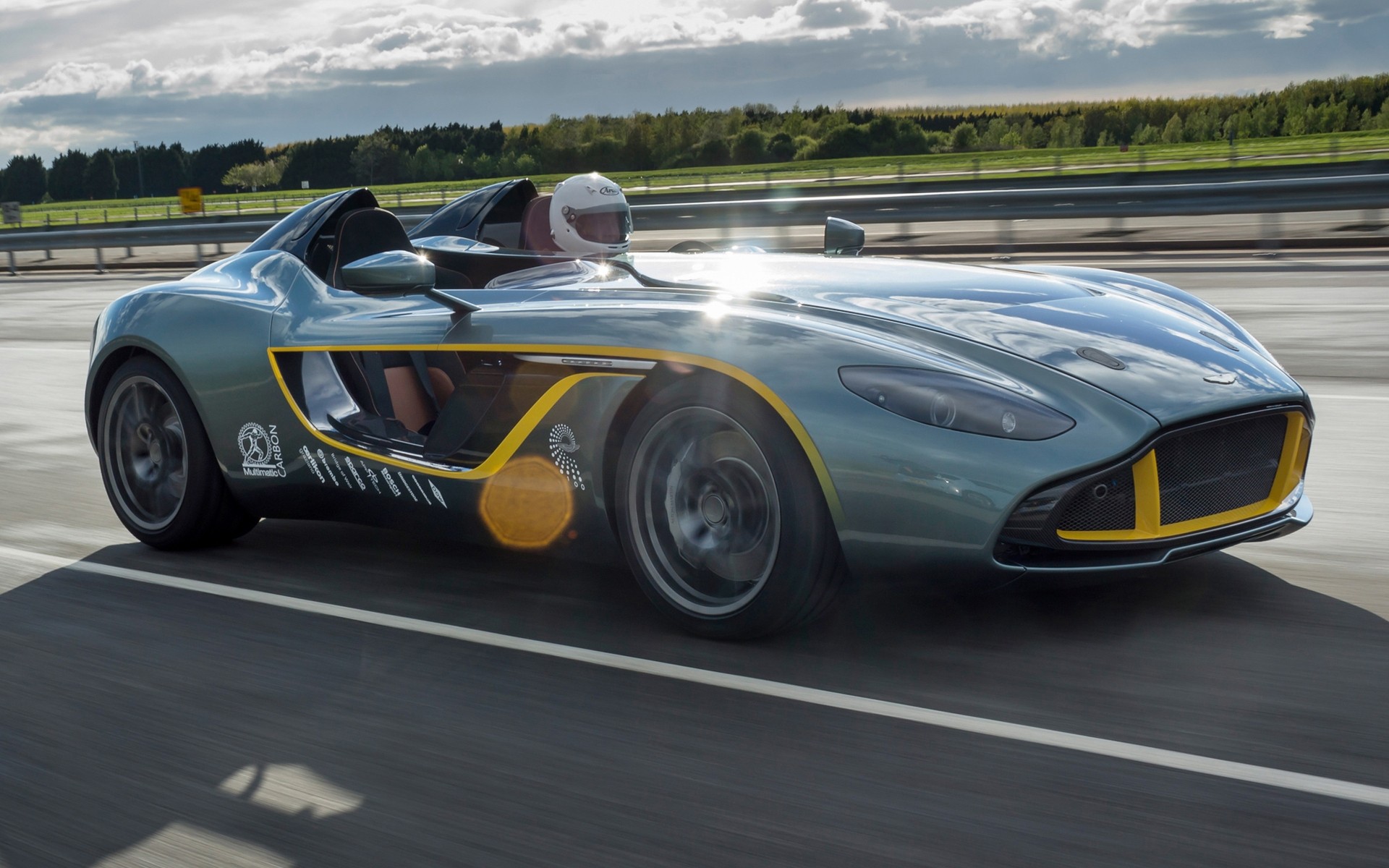 aston martin carreras coche competencia coche prisa campeonato pista deporte del coche acción rápido unidad asfalto sistema de transporte negro ruedas aston martin cc100