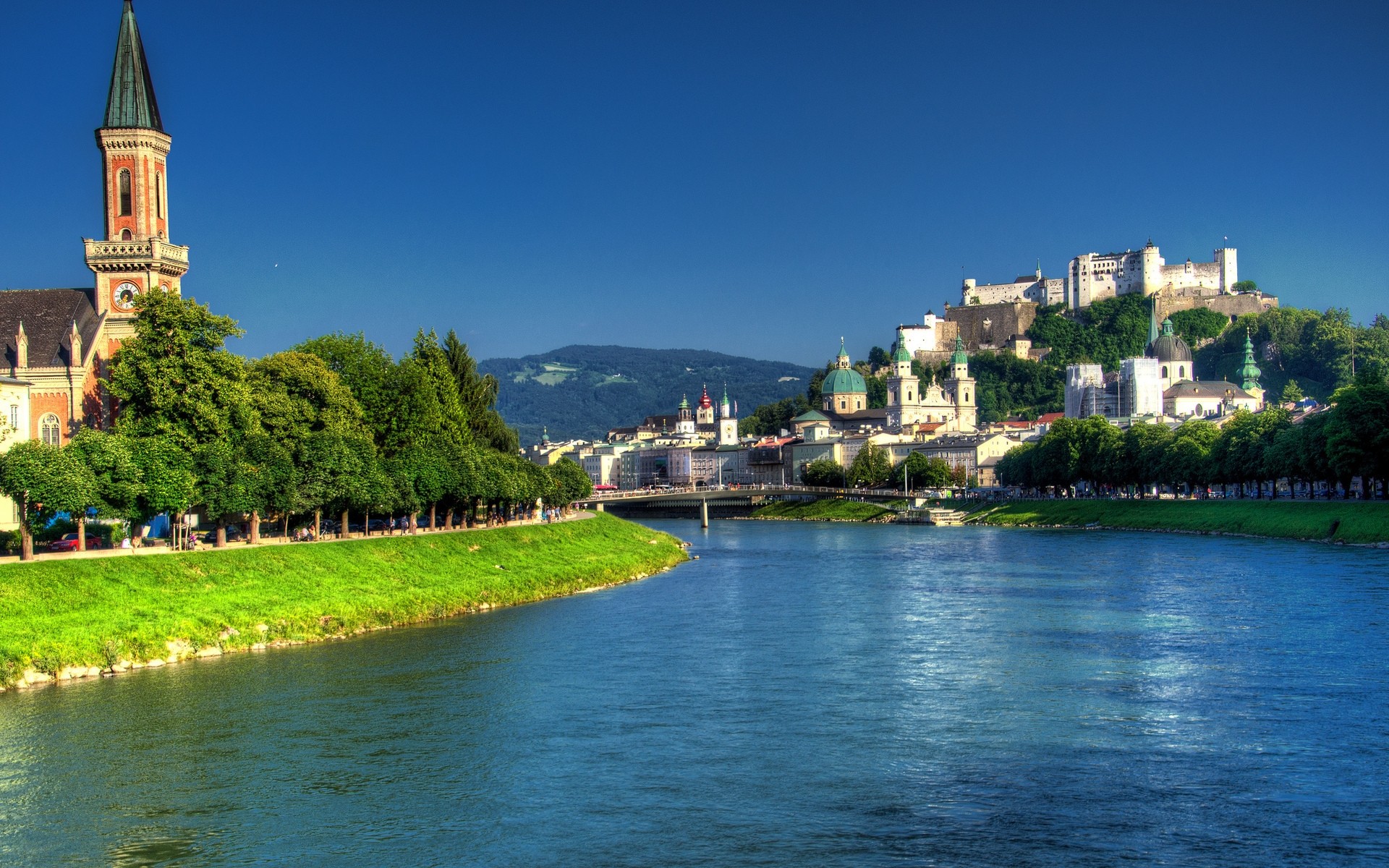 outras cidades arquitetura água rio igreja viagens cidade ao ar livre casa catedral castelo lago cidade cidade céu luz do dia reflexão torre árvore rio salzach salzburgo áustria