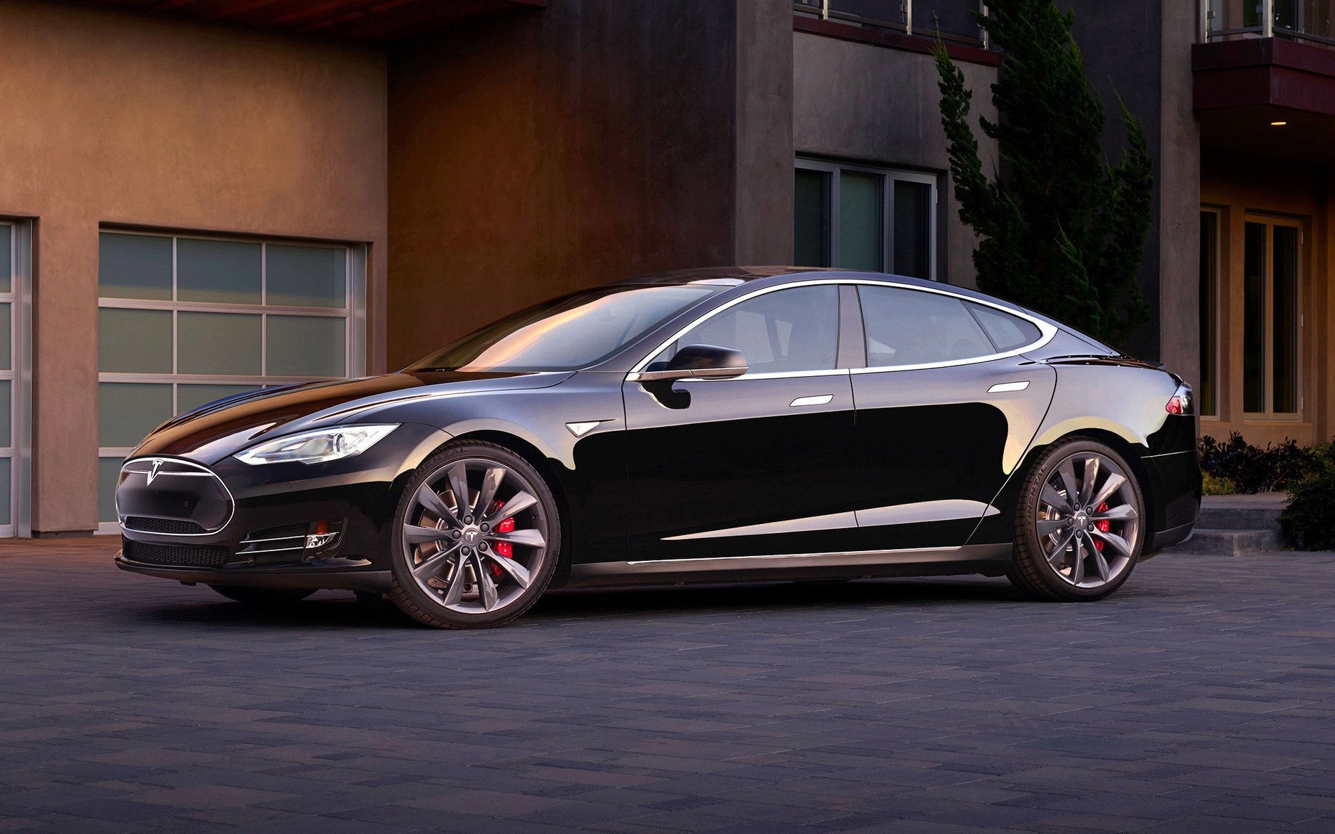 tesla car vehicle automotive pavement blacktop coupe wheel transportation system noon asphalt fast drive show sedan tesla model s