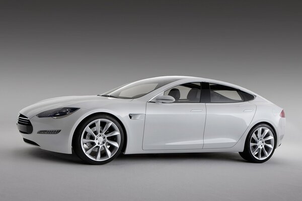 White Tesla on alloy wheels