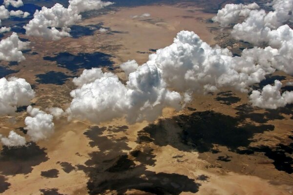 View from the window of the aircraft. The clouds