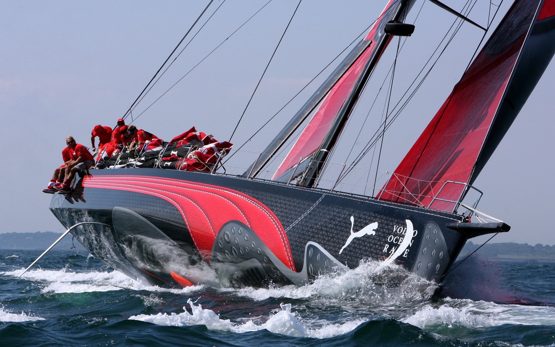 esporte veleiro vela embarcação iate água corrida barco regata sistema de transporte navio mar oceano carro esportes aquáticos vento tripulação pressa mastro fuzileiro naval preto vermelho azul