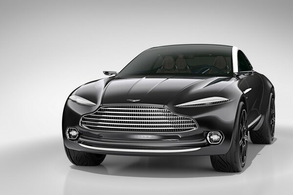 Шикарний чорний Aston Martin спереду