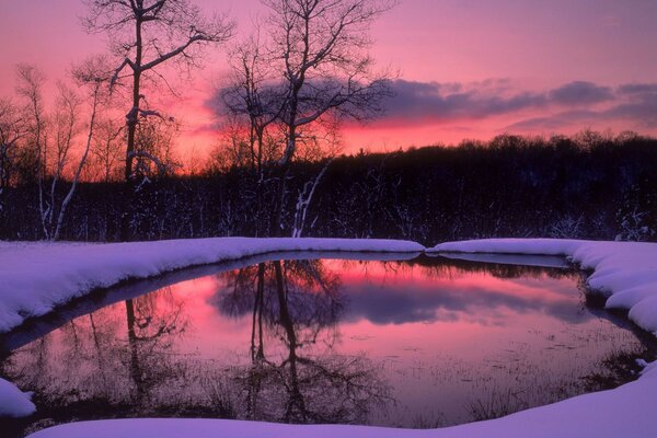 Dawn on the lake in winter