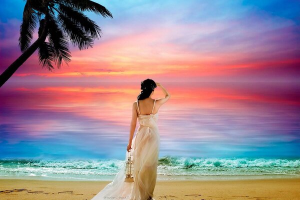 A girl in white on the seashore