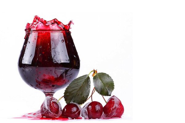 A glass of wine and iced cherries