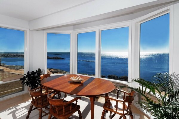 Dining table in front of the bay window