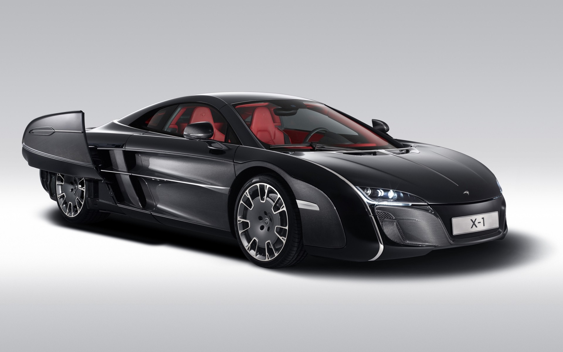 concept cars car vehicle wheel automotive coupe fast sedan noon blacktop transportation system drive mclaren x1