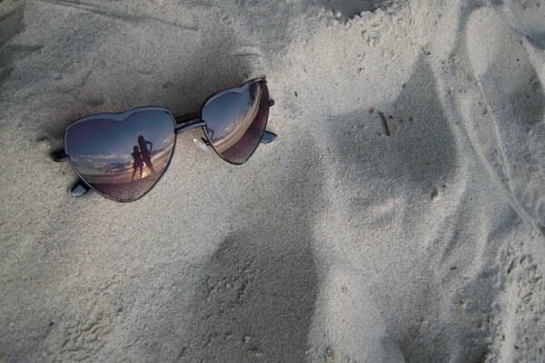 Glasses on the background of the sea beach