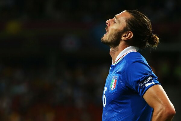 Famous football player in a blue T-shirt