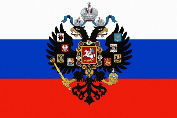 Герб России на фоне флага России