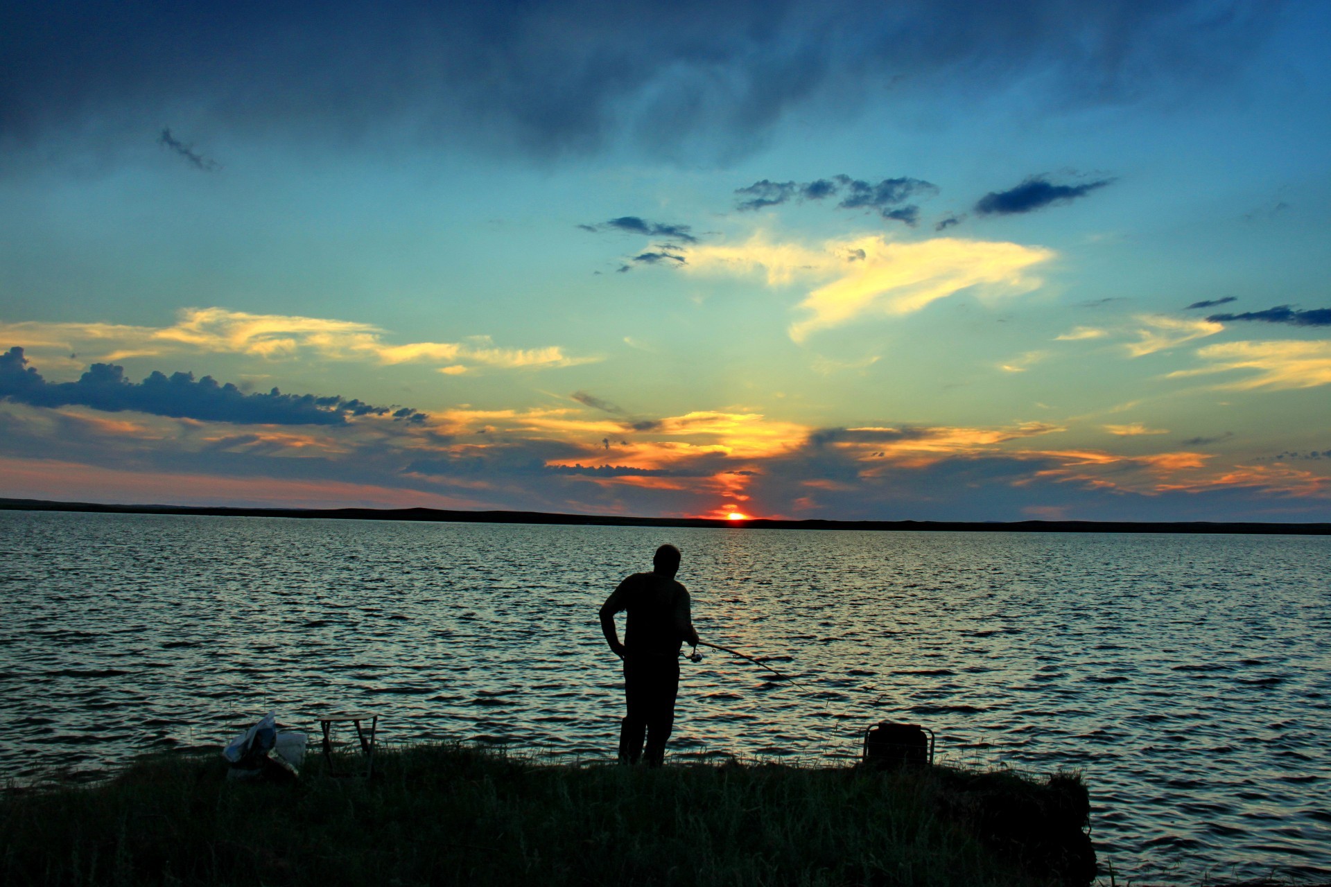 on vacation sunset water dawn evening dusk lake sun backlit silhouette landscape reflection sky sea beach