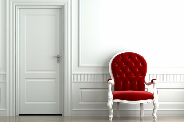 A red armchair in a white room
