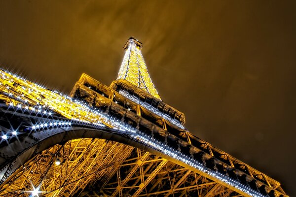 Eiffel Tower in lights in the evening