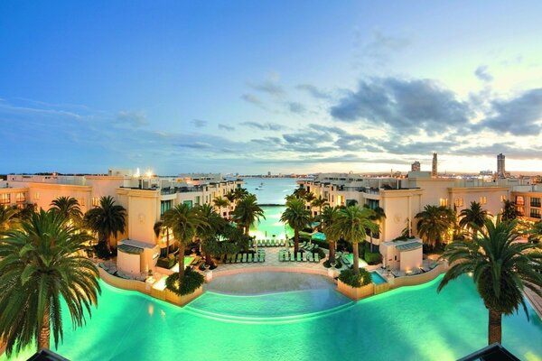 View from the hotel window on the pool and the sea