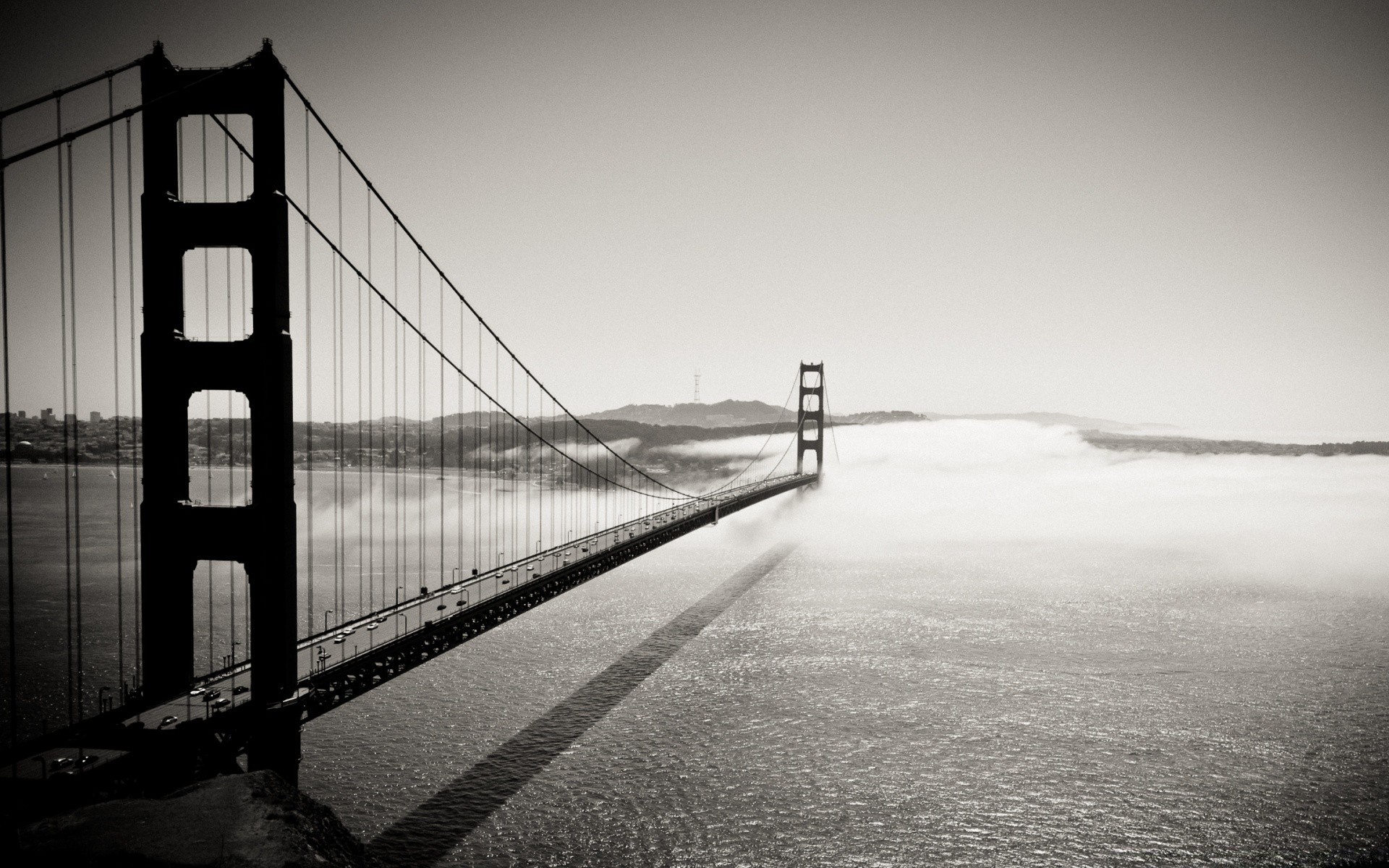 blanco y negro puente monocromo agua puesta de sol luz reflexión mar río paisaje amanecer sistema de transporte puente colgante cielo ciudad niebla océano calle playa viajes