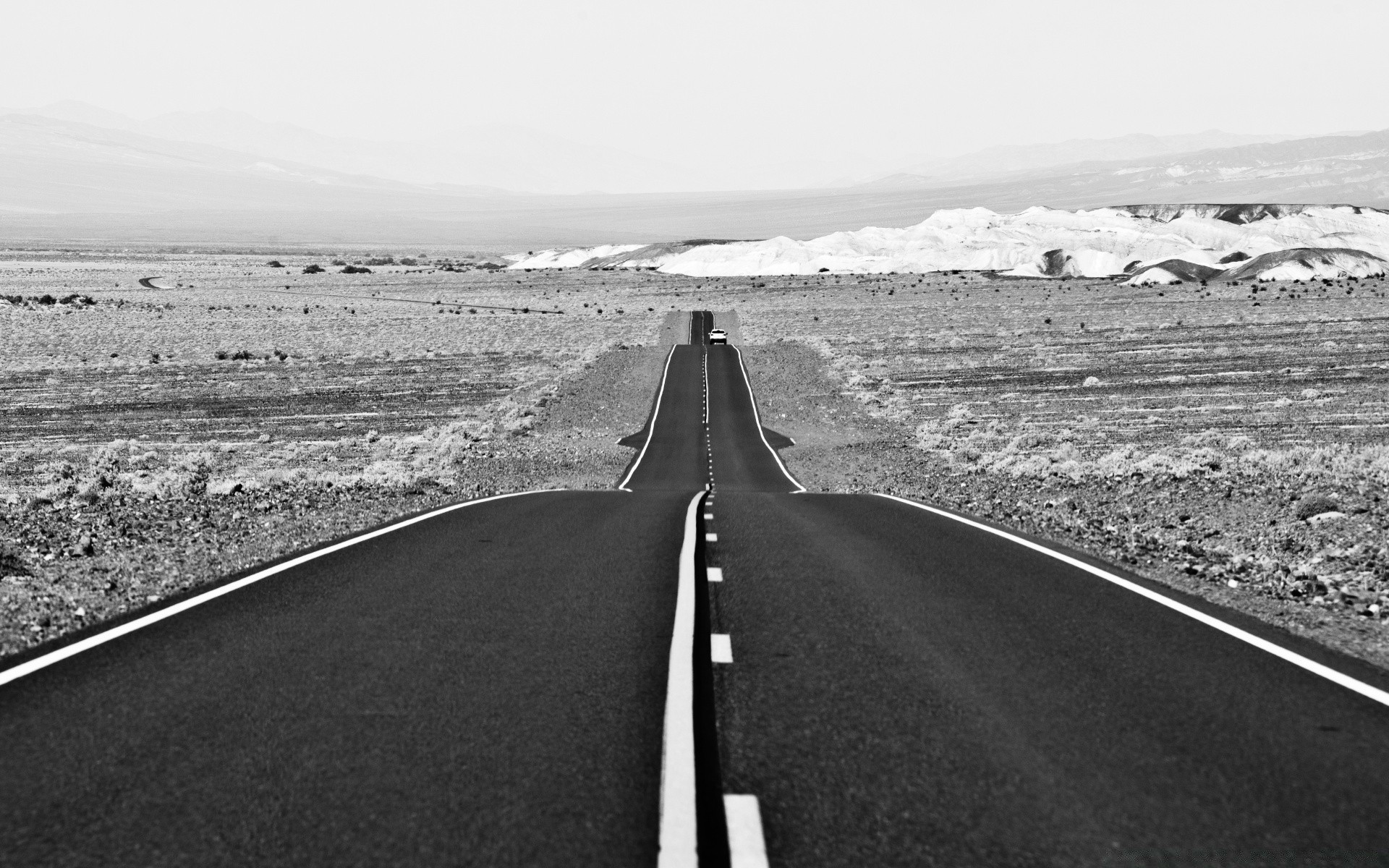 in bianco e nero autostrada strada asfalto paesaggio viaggi sistema di trasporto strada vuoto deserto cielo in bianco e nero manuale corda all aperto