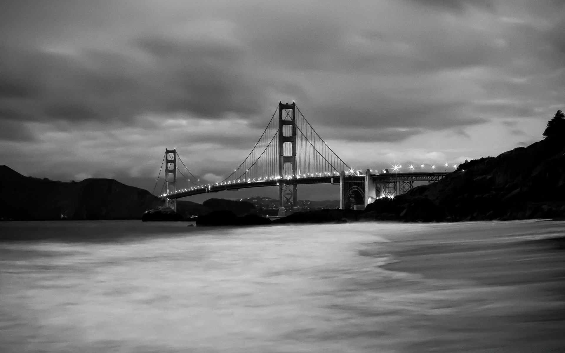 schwarz und weiß wasser brücke transportsystem auto monochrom meer hängebrücke ozean sonnenuntergang fluss boot dämmerung wasserfahrzeug strand landschaft himmel reisen schiff