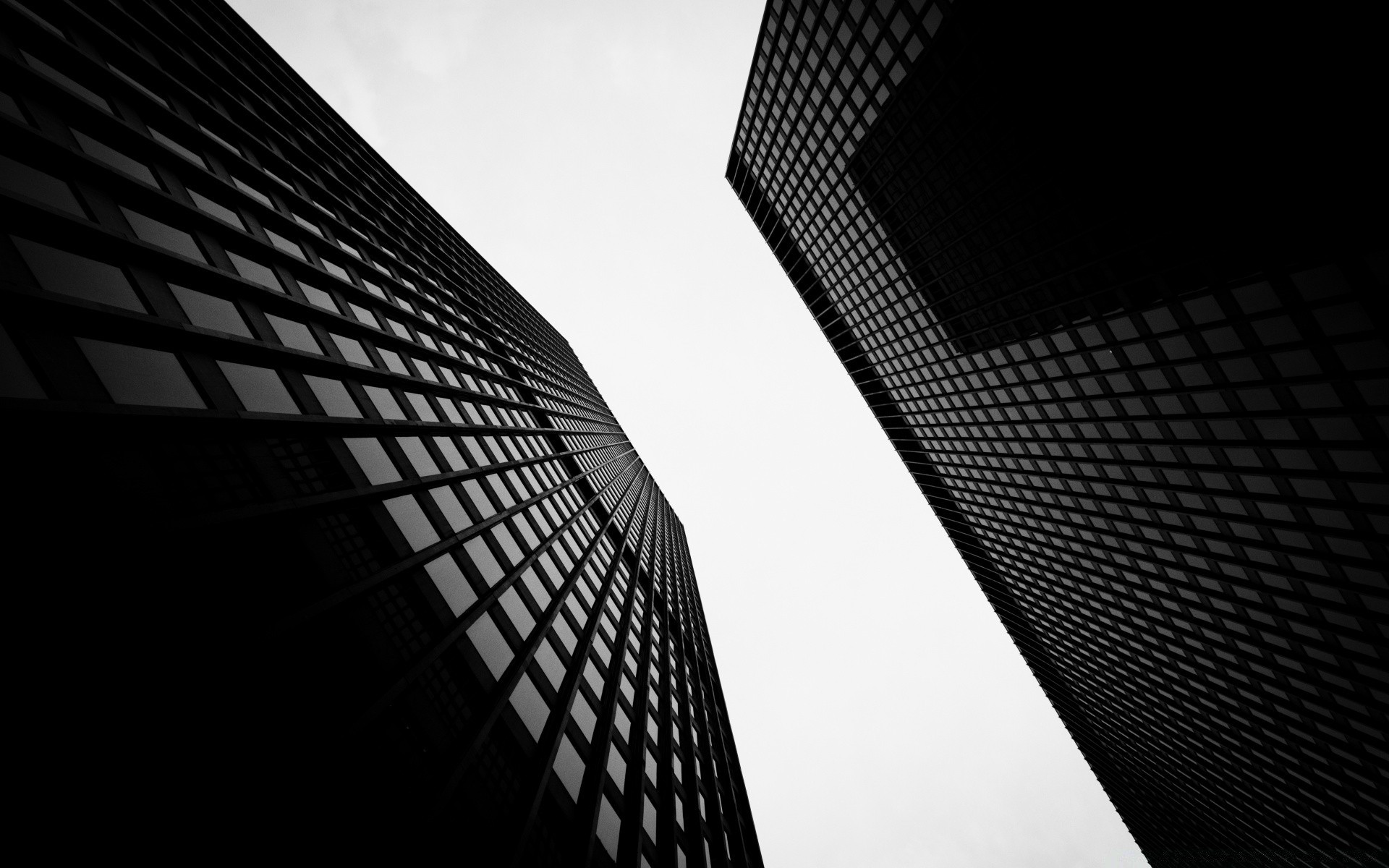 noir et blanc gratte-ciel bureau moderne fenêtre verre entreprise ville futuriste réflexion architecture acier monochrome maison centre-ville urbain perspective ville bureau haut