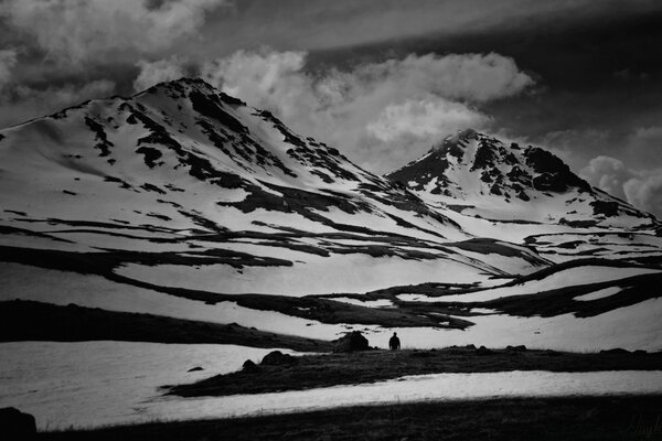 Snow-covered black and white mountains