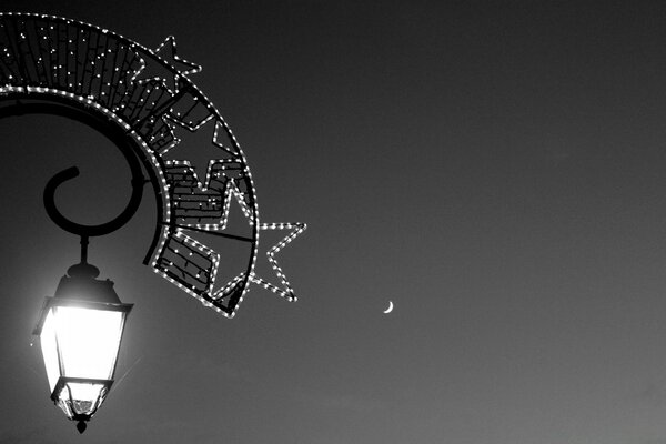 A big bright lantern and a tiny moon