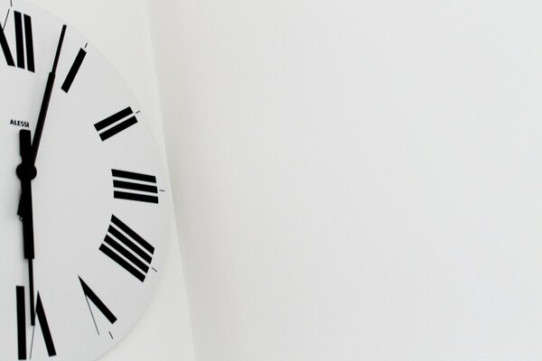Black and white clock on the wall
